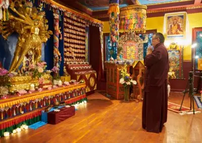 In the heart of Kalapa Temple, Khentrul Rinpoche prays before the 24-armed image of Kalachakra