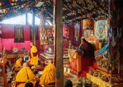 Khentrul Rinpoche, joined by other lamas, performing a ceremonial blessing for the Land of Shambhala, infusing the land with spiritual energy and protection.