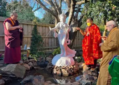 H.E. Kathog Rigzin Chenpo Rinpoche and Khentrul Rinpoche offer blessings to a graceful white Arya Tara statue.